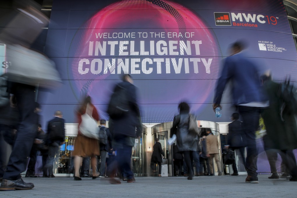 Attendees enter the Fira Gran Via complex where the four-day MWC Barcelona, the world’s largest exhibition for the mobile industry, is held annually in Spain. Photo: Bloomberg