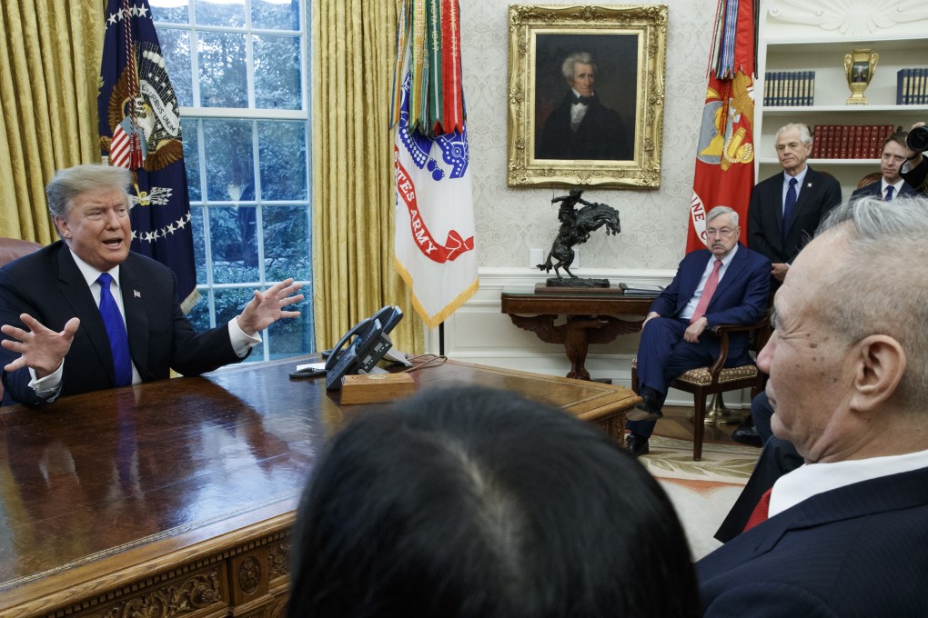 Chinese Vice-Premier Liu He (right) with US President Donald Trump and members of both sides’ negotiating teams in the White House Oval Office on Friday. Photo: EPA-EFE