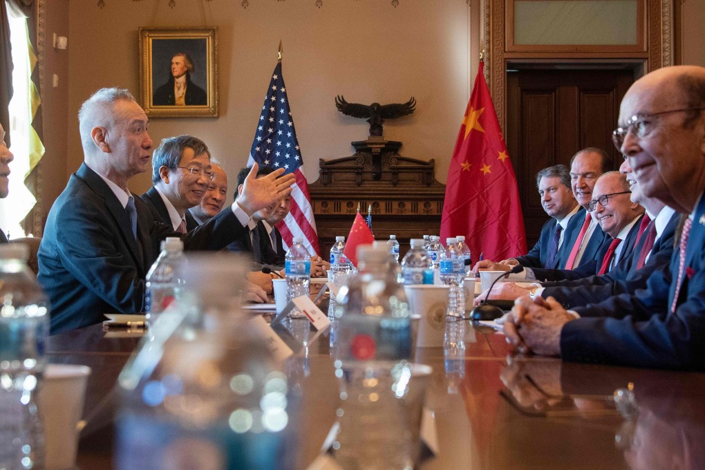 The US delegation of trade negotiators talk with their Chinese counterparts in Washington on January 30. Photo: AFP