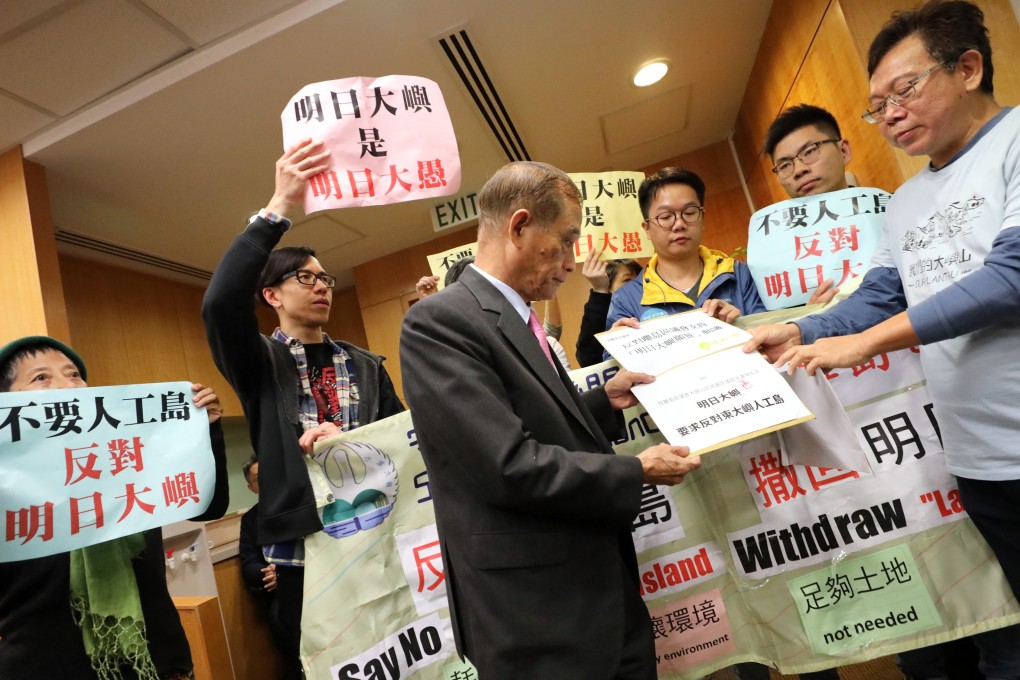 The Save Lantau Alliance protests outside the Islands District Council meeting. Photo: Felix Wong