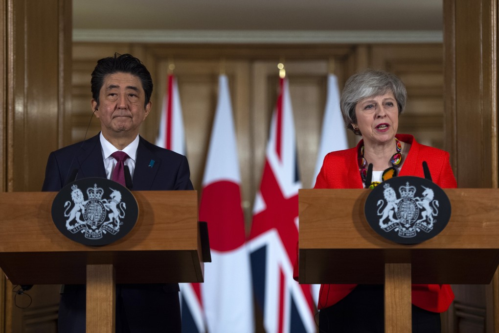 UK Prime Minister Theresa May speaks while Japan’s Prime Minister Shinzo Abe listens during their joint news conference in London on January 10. Britain’s attempts at negotiating a post-Brexit trade deal with Japan hit a roadblock when Tokyo expressed frustration with UK officials’ negotiation tactics. Photo: Pool via Bloomberg