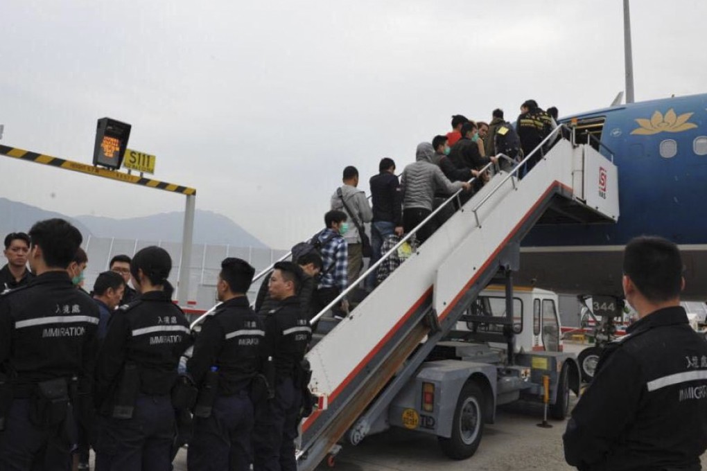 Hong Kong immigration authorities send 68 unsuccessful asylum seekers and illegal immigrants back to Vietnam on a chartered flight in 2017, in a bid to tackle the huge backlog of cases involving torture claimants in the city. Photo: Handout