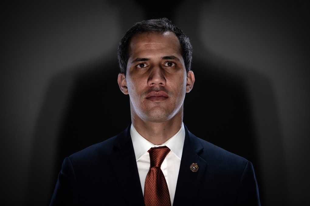Venezuelan opposition leader Juan Guaido has vowed to return to Caracas from Colombia despite the threat of being arrested. Photo: Bloomberg