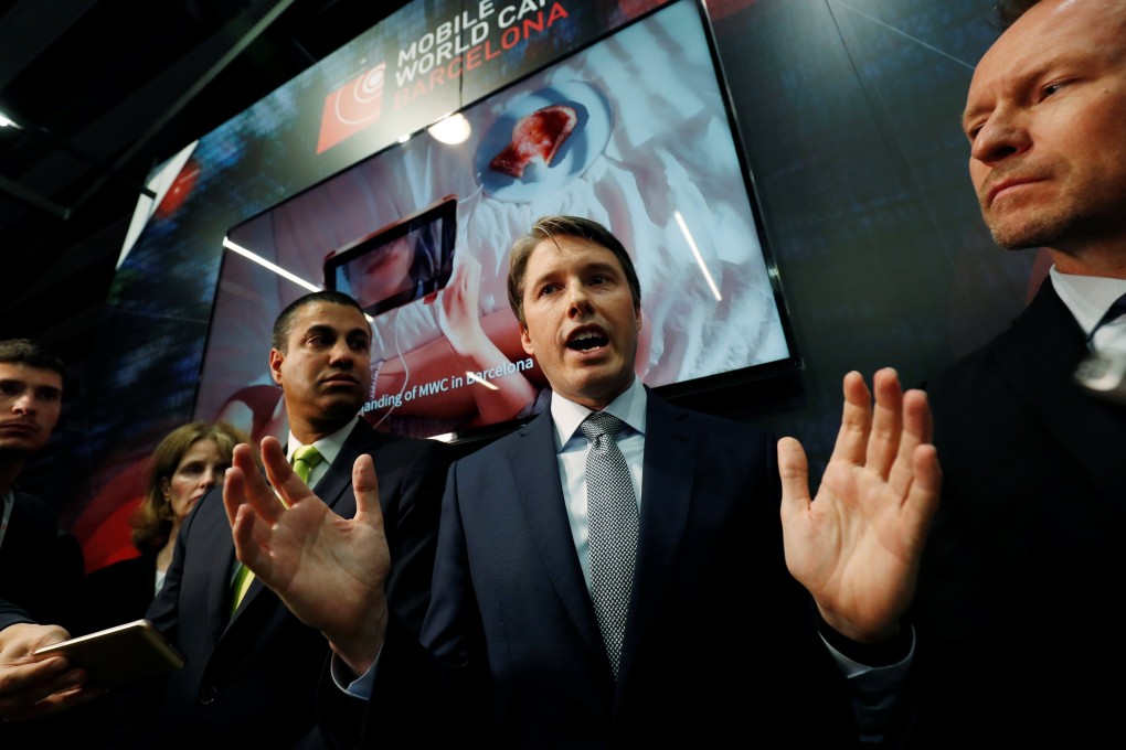 Robert Strayer of the US State Department (centre) holds a news briefing at the Mobile World Congress in Barcelona, Spain, on Tuesday. Photo: Reuters