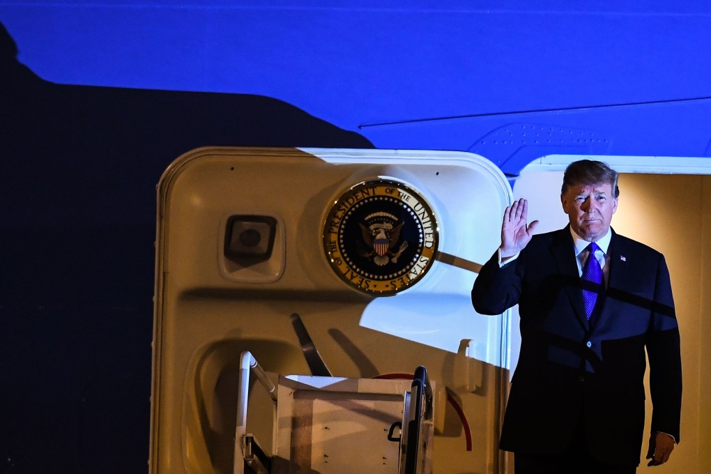 US President Donald Trump disembarks from Air Force One after arriving at Noi Bai International Airport in Hanoi, Vietnam on Tuesday for a second summit with North Korean leader Kim Jong-un. Photo: AFP