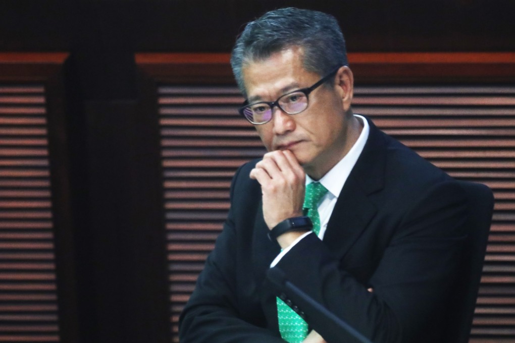 Financial Secretary Paul Chan attends a Legislative Council meeting on his latest budget. Photo: Dickson Lee