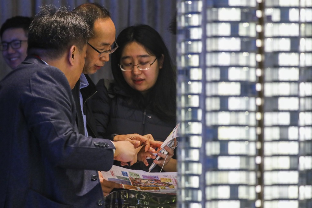 People line up for the 161 units on sale of Sino Lan's Grand Central phase two development in Kwun Tong on 23 February 2019. Photo: SCMP/Edmond So