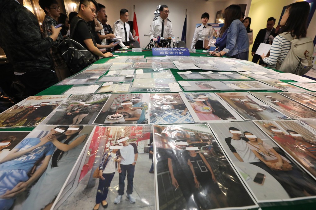 The Immigration Department displays photos taken in various settings and which were used by the fake couples as evidence of their relationship. Photo: Felix Wong