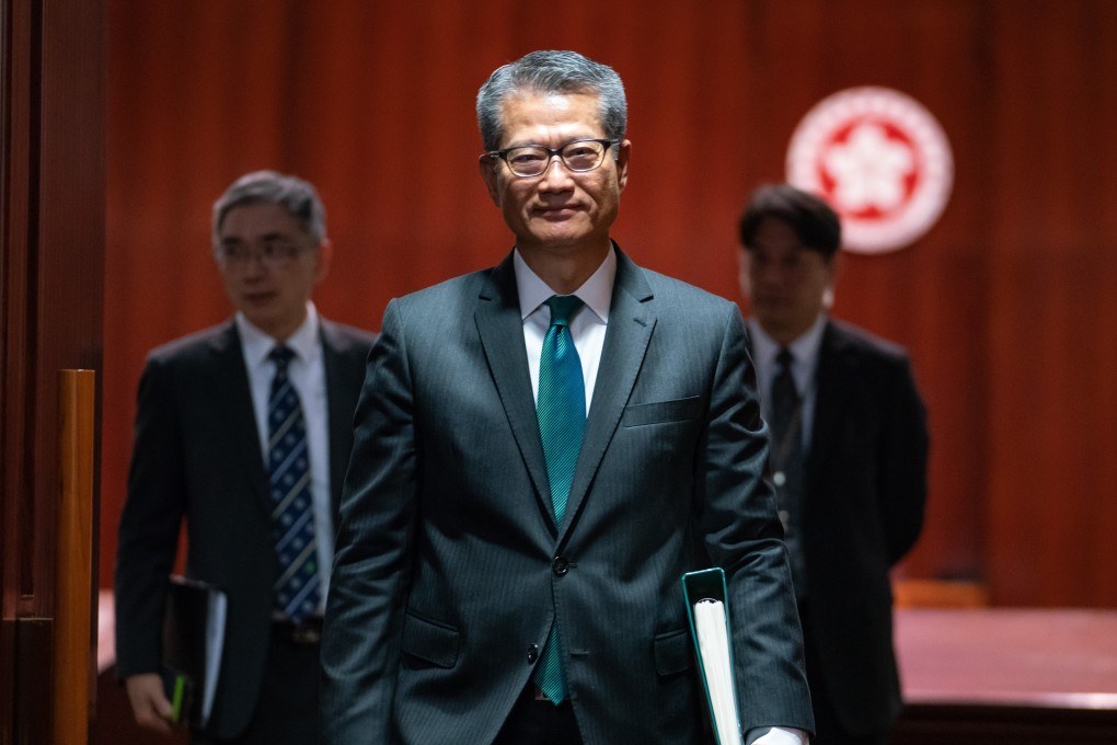 Financial Secretary Paul Chan leaves after delivering his budget speech at the Legislative Council on February 27. Photo: Bloomberg
