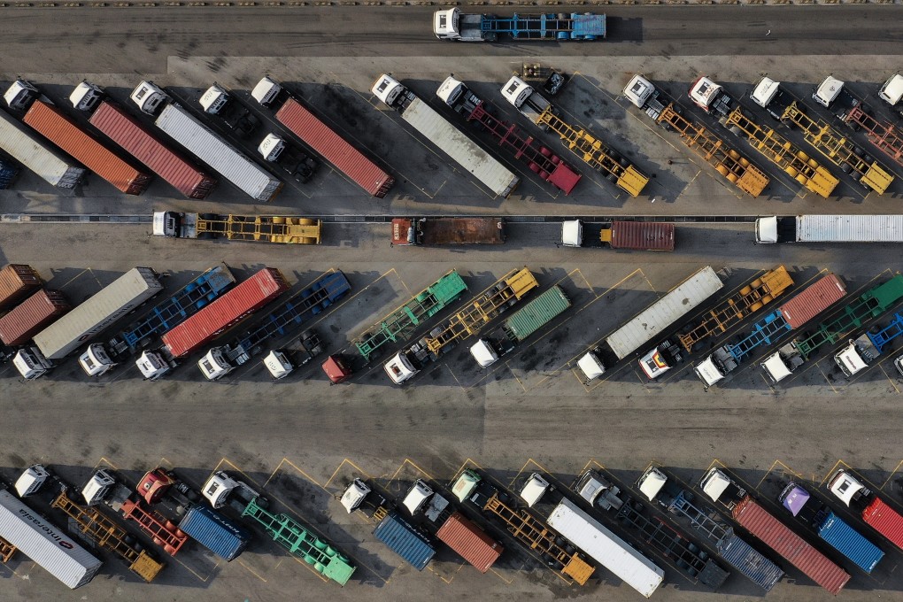 Container trucks parked at Hong Kong’s Kwai Tsing container port. Photo: Roy Issa