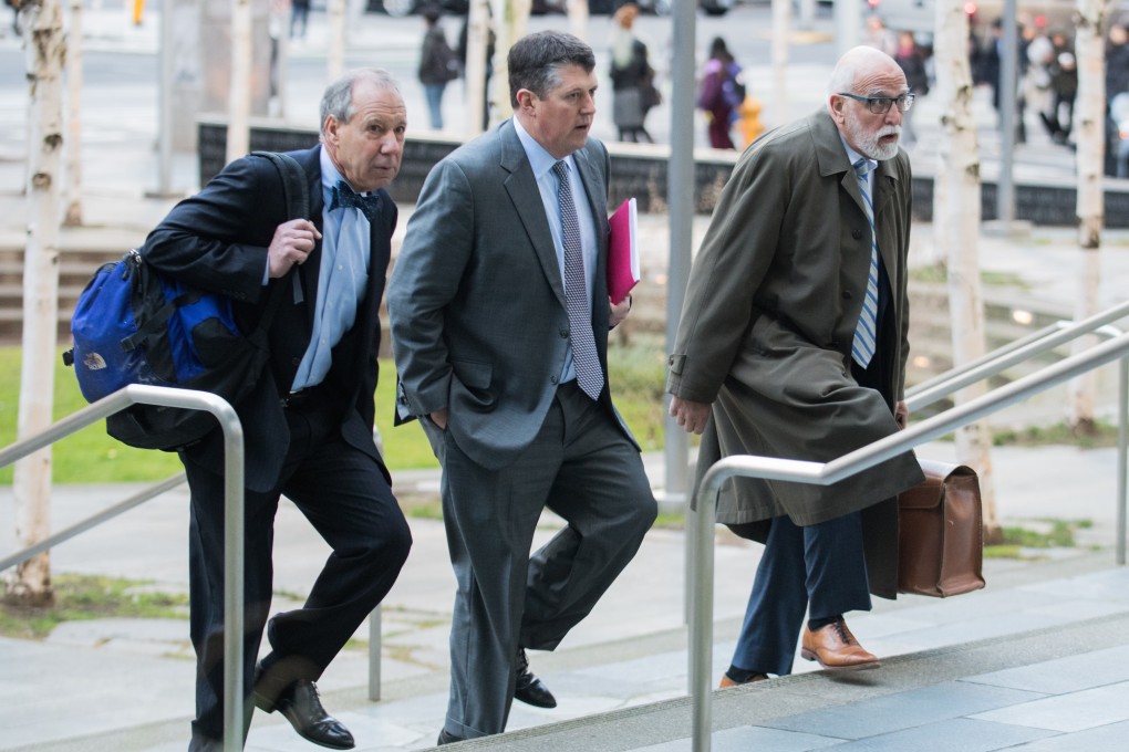 Lawyers for Huawei (from left) Robert Westinghouse, Brian Heberlig and James Hibey arrive at federal court in Seattle, Washington, on Thursday. Photo: Bloomberg