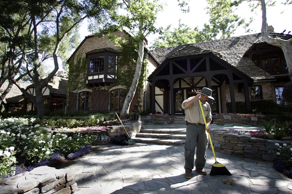 A worker sweeping at ‘Neverland Ranch’ in Los Olivos, California in July 2009. Photo: TNS