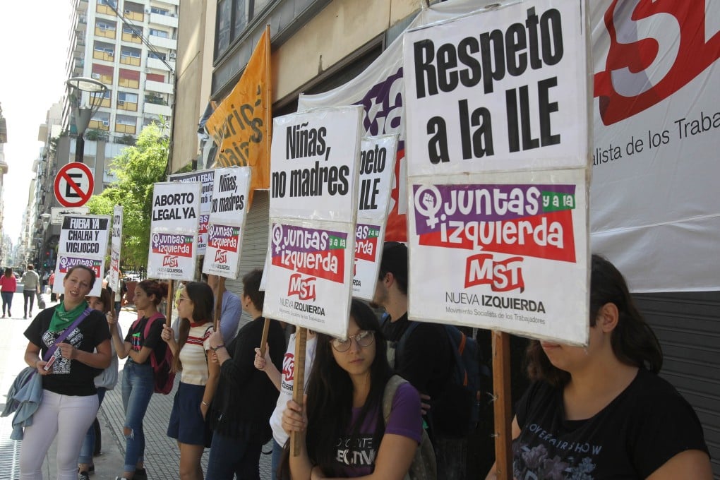 People protest in Buenos Aires, Argentina on February 25 to demand court allow abortion for an 11 year-old who was raped. Photo: EPA-EFE