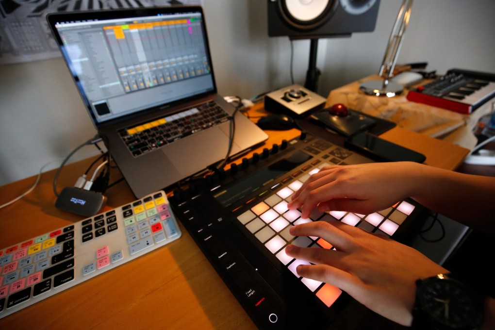 Sarouna, a Palestinian DJ, works on a music track at her home in the West Bank city of Ramallah. Photo: Abbas Momani/AFP