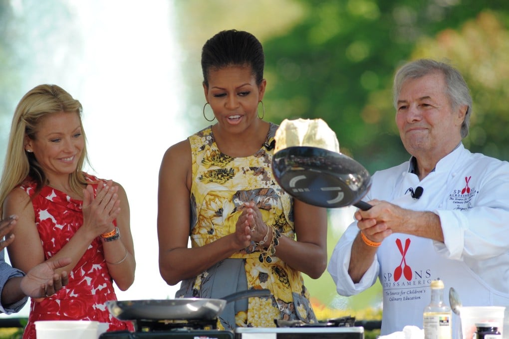 Jacques Pépin (right) with American first lady Michelle Obama (centre) and television personality Kelly Ripa at the 2011 White House Easter Egg Roll, in Washington. Picture: AFP