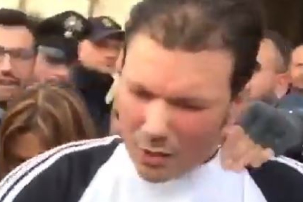 Police allowed Marco Di Lauro to change his clothes and freshen up before taking him away, local media reported. Photo; YouTube