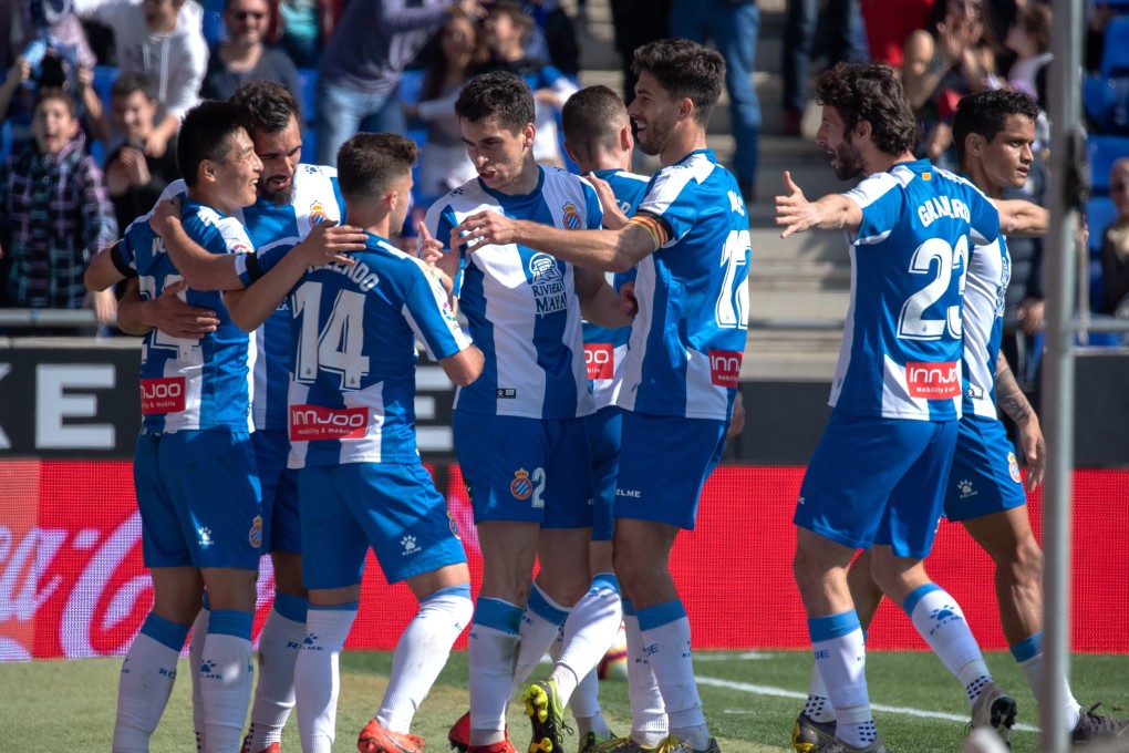 Espanyol's Wu Lei, left, with his teammates after he became the first Chinese player to score in a Spanish league match in Barcelona on Saturday. Photo: Xinhua