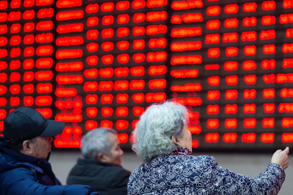 Investors check out stock prices at a trading hall in Nanjing, east China's Jiangsu Province, on February 25, 2019. Photo: Xinhua