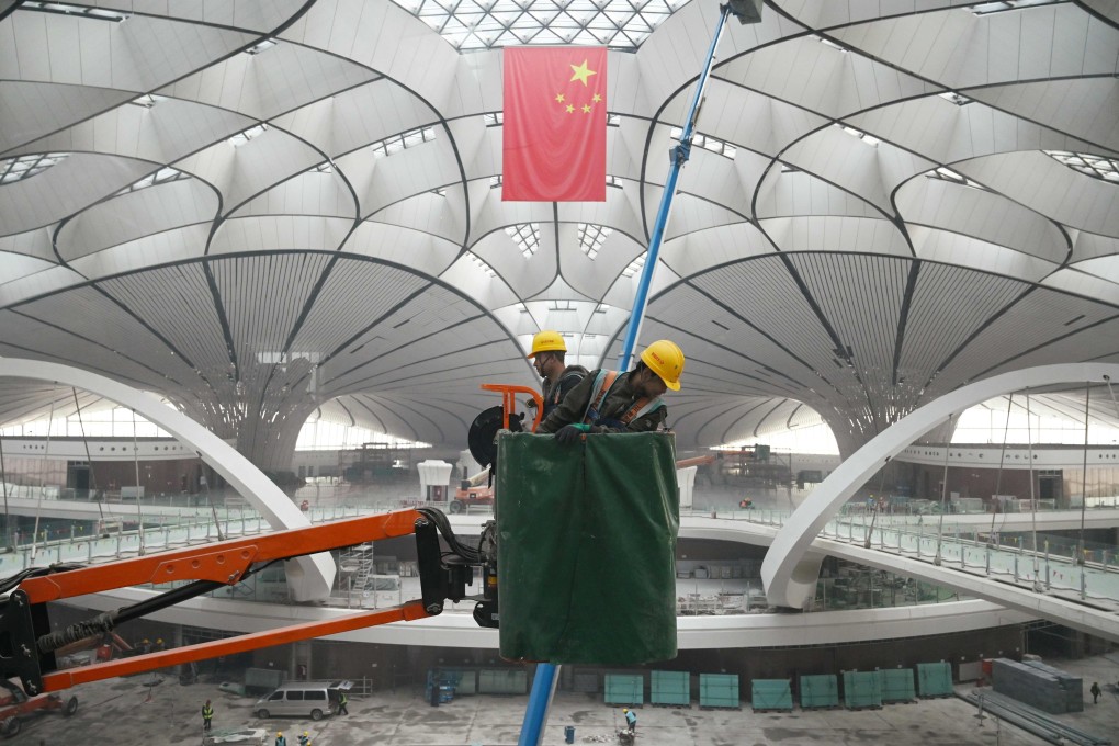 Construction work at Beijing airport: a symbol of the country’s economic resilience. Photo: AFP