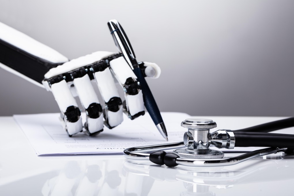A robotic hand fills up a form with stethoscope over desk. China is pushing to advance its prowess in artificial intelligence, from surveillance equipment to self-driving cars. Photo: Handout