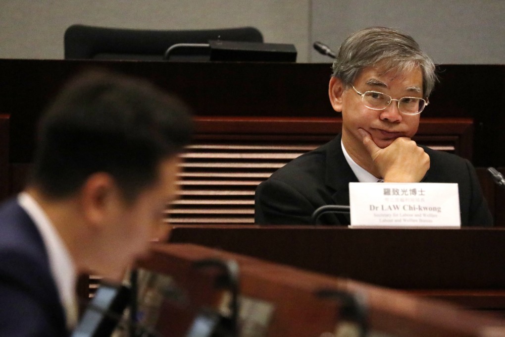 Secretary for Labour and Welfare Law Chi-kwong (right) pledged to buy property for the plan only when the price was reasonable. Photo: Felix Wong