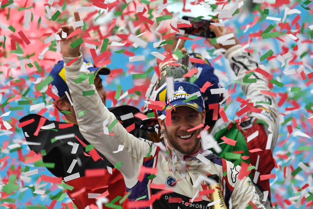 Sam Bird celebrates on the podium after the Rome leg of the Formula E electric car championship in Rome in 2018. Photo: Andreas Solaro/AFP