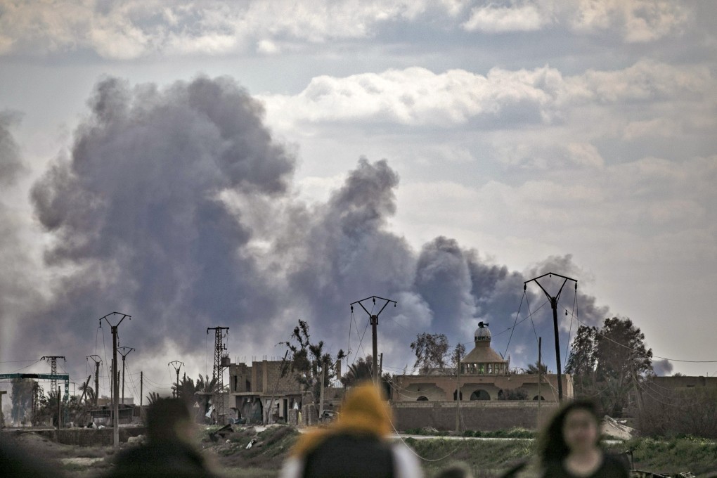 Smoke billows after the shelling of Baghouz on Saturday. Photo: AFP