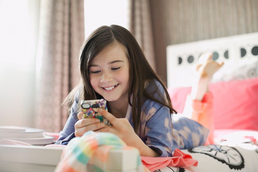 Should I let my 11-year-old have a social media account? asks a concerned mother. Photo: Alamy