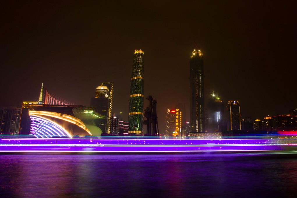 A long-exposure photo of boats passing a business area along the Pearl River in Guangzhou, Guangdong province. The Greater Bay Area plan puts Hong Kong in a stronger position to finance and collaborate with Shenzhen’s and Guangzhou’s innovative and internationally minded hi-tech manufacturing and services sectors. Photo: Reuters