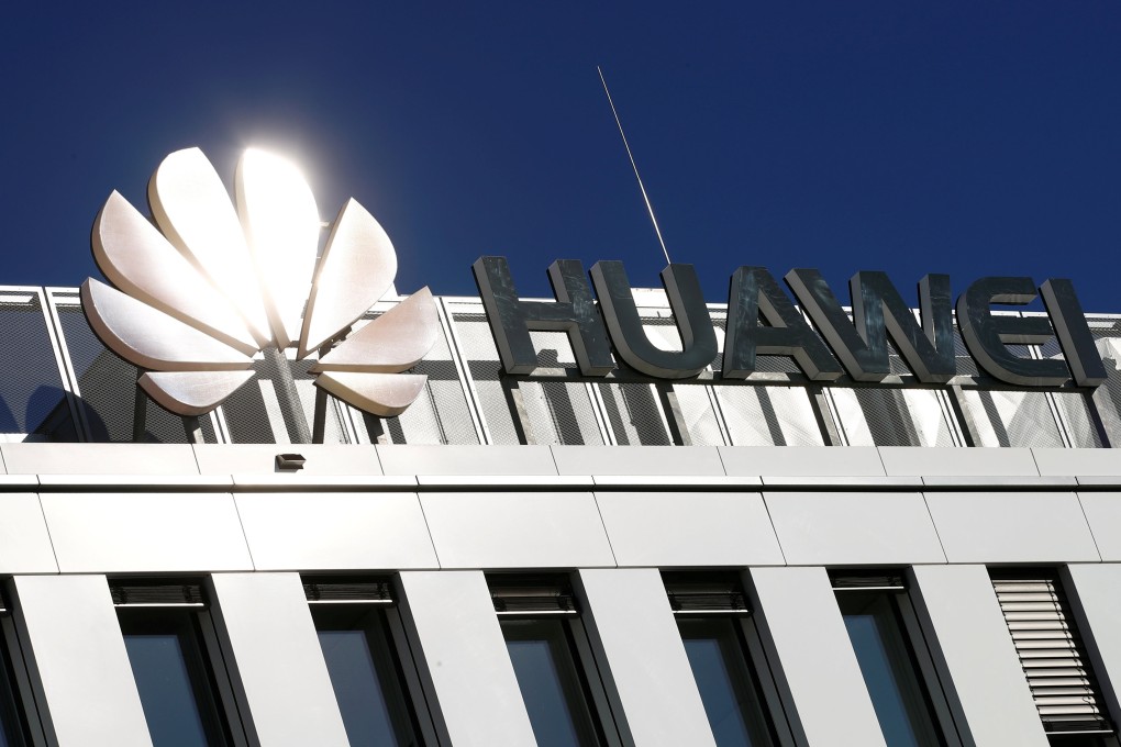 The logo of China's Huawei Technologies shines over the German headquarters of the telecommunications giant in Düsseldorf. Photo: Reuters