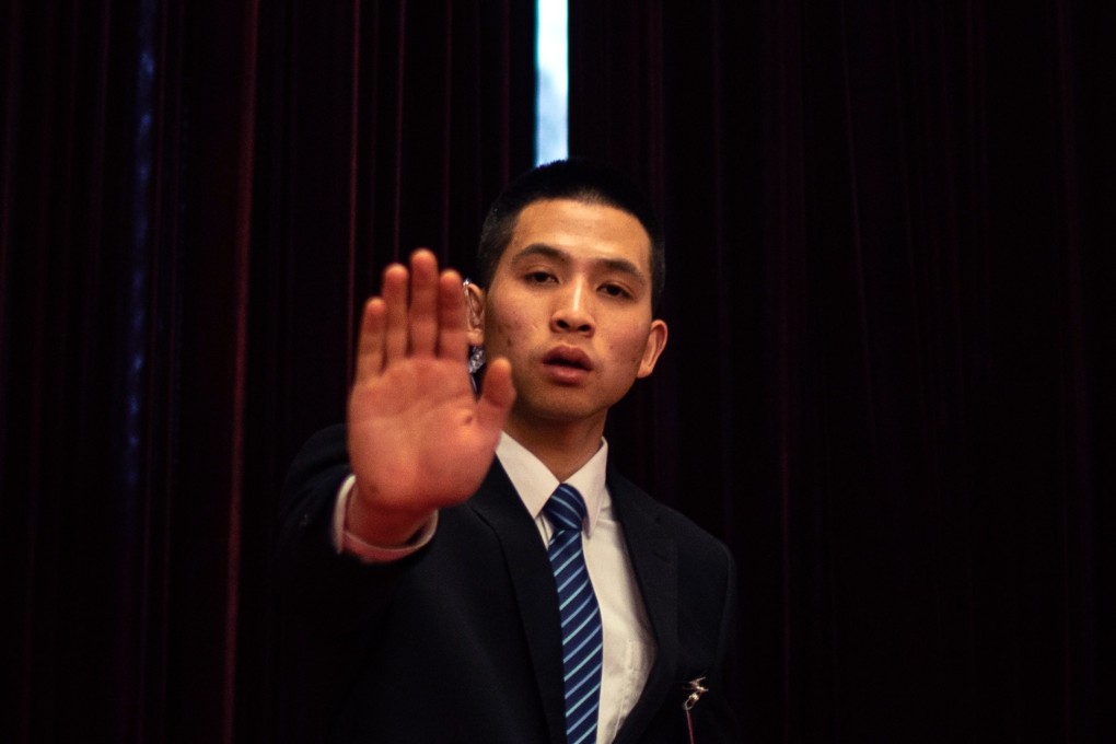 A security officer bars the way outside the Great Hall of the People in Beijing. Photo: EPA-EFE