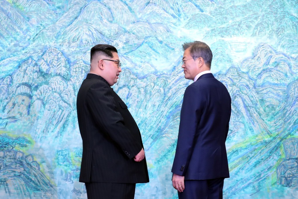 North Korean leader Kim Jong-un and South Korean President Moon Jae-in in the Demilitarised Zone in April 2018. Photo: EPA