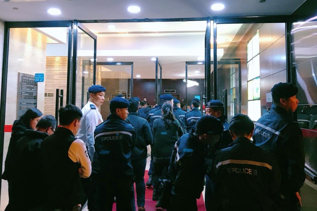 A group of police officers deployed in an anti-triad operation in Tsim Sha Tsui on Monday night. Photo: Handout