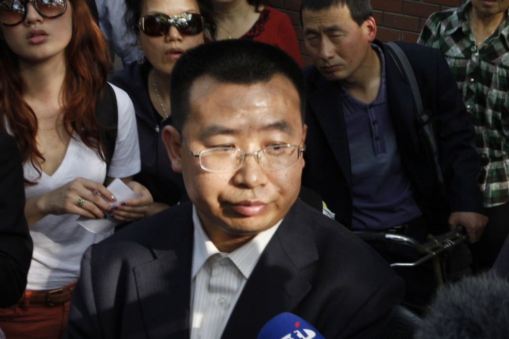 Jiang Tianyong, pictured in 2012, is threatening to protest if he is blocked from seeing his wife and daughter. Photo: AP