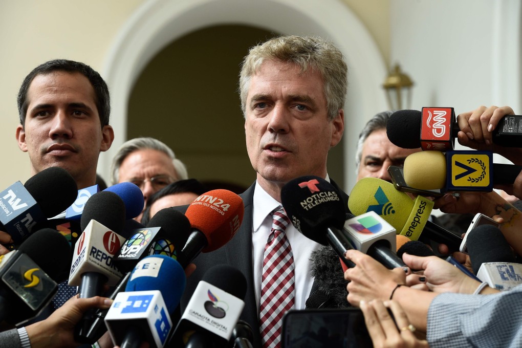 German ambassador to Venezuela Daniel Kriener, Germany’s ambassador to Venezuela, speaking with the news media last month. Venezuela ordered his expulsion on Wednesday. Photo: AFP