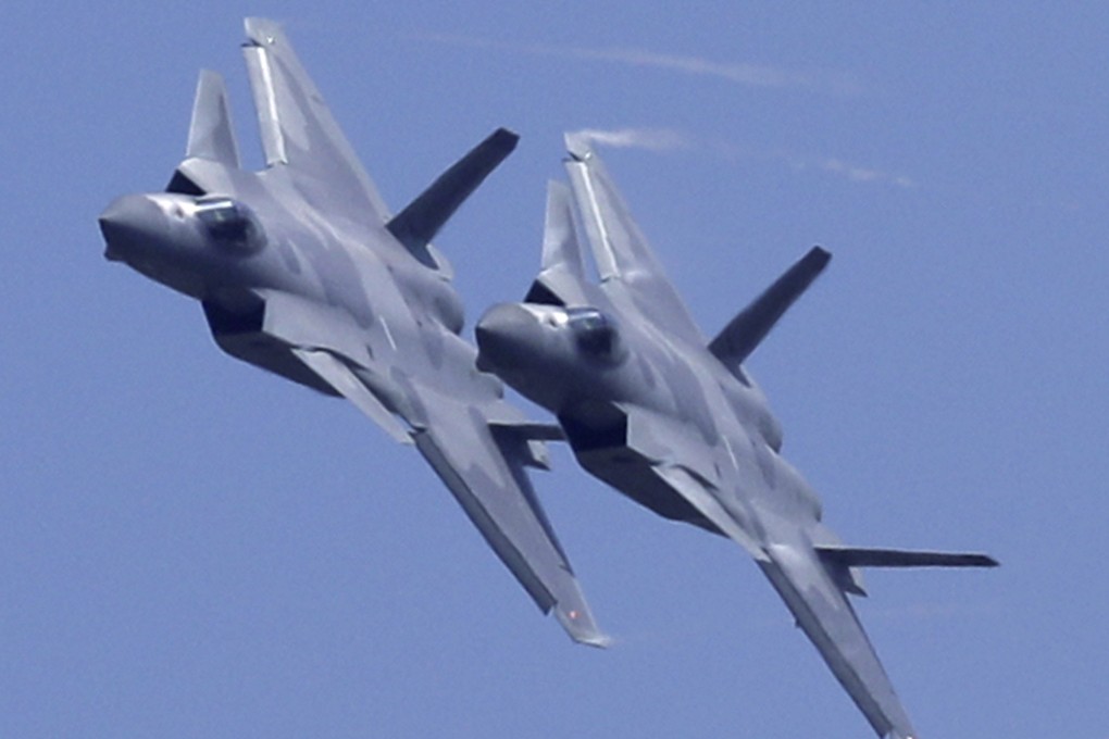 Two J-20 stealth fighter jets of the Chinese People's Liberation Army. Given the slowing Chinese economy and the trade war with the US, the defence budget of 1.18 trillion yuan (US$176 billion) is modest and realistic. Photo: AP