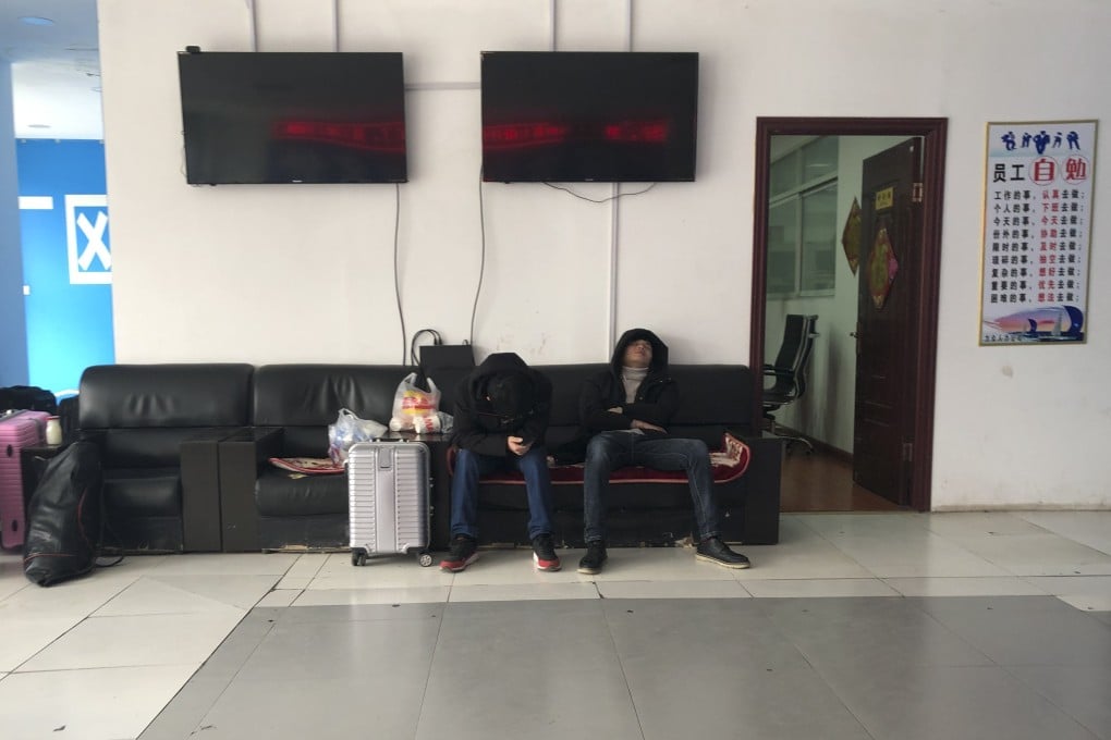 Workers take nap in a job agency near Zhengzhou Foxconn, Henan province. Photo: Cissy Zhou