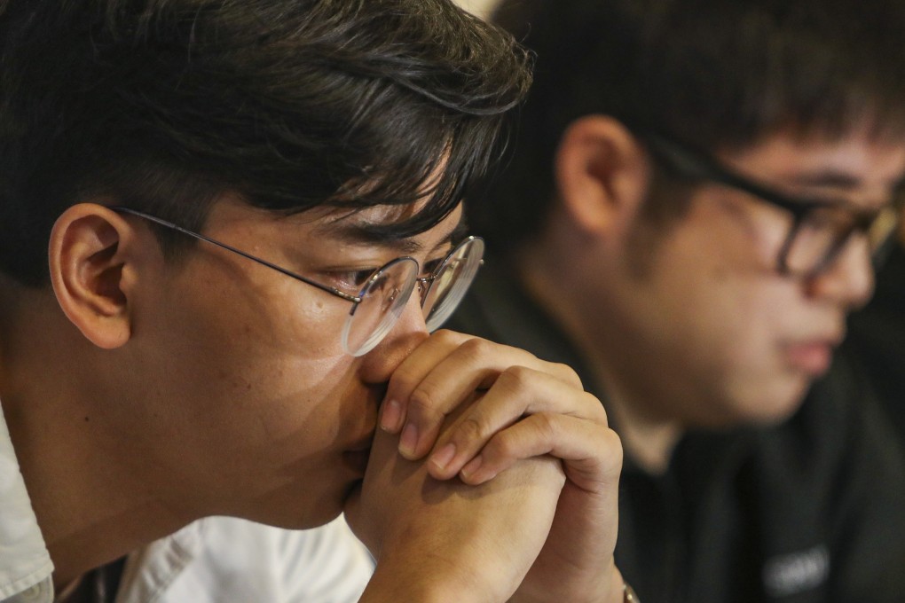 Suspended Polytechnic University student Lam Wing-hang (left) and expelled student Gerald Ho Jun-him hold a press conference over their punishments. Photo: Winson Wong