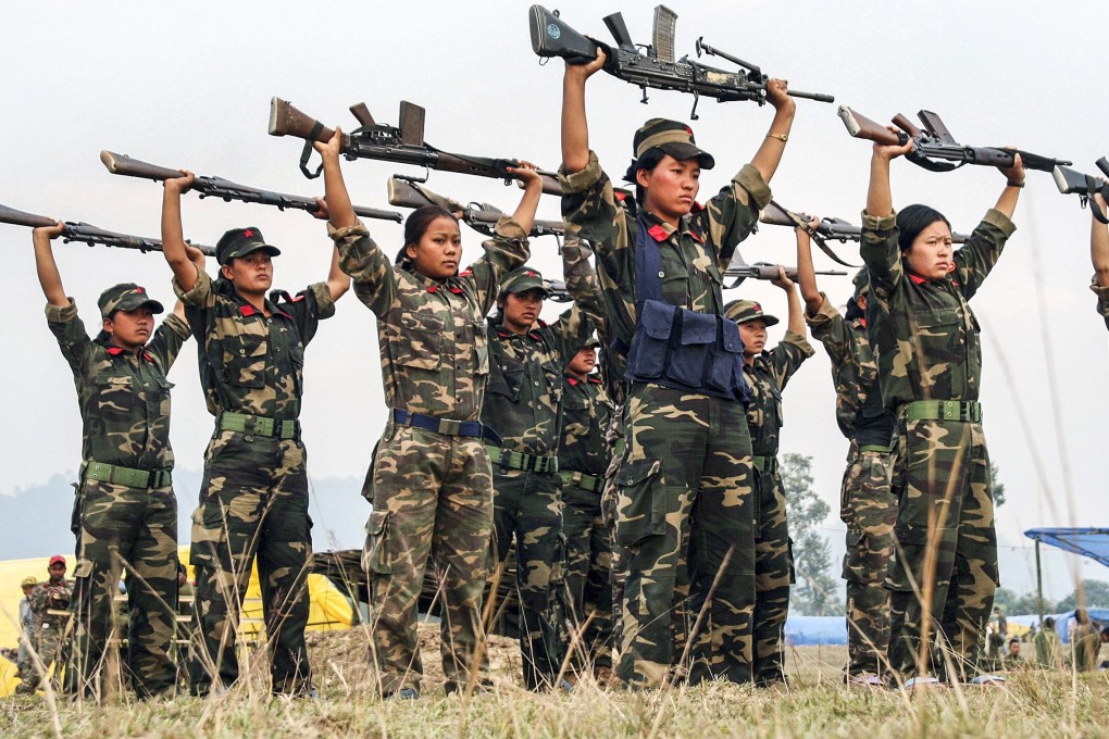 Maoist rebel women soldiers perform a drill in Jhapa district, about 575km east of Kathmandu, Nepal, in November 2006. Some countries remain haunted by their Maoist pasts. Picture: AFP