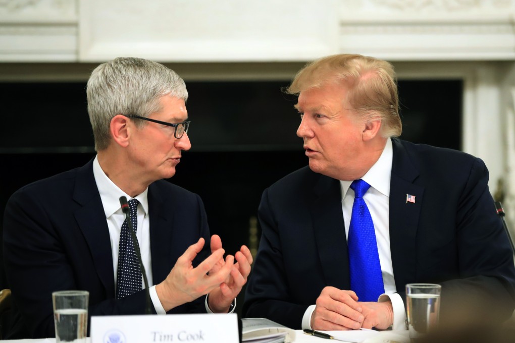 Apple CEO Tim Cook has apparently embraced President Trump calling him ‘Tim Apple’. Photo: AP