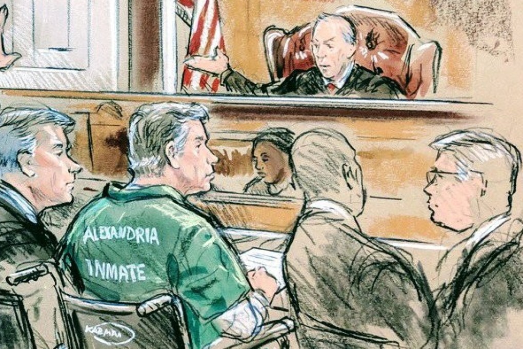 There was no bespoke suit or titanium watch. There was just a 69-year-old man in a green prison jumpsuit stamped with ‘Alexandria Inmate’. Photo: Reuters