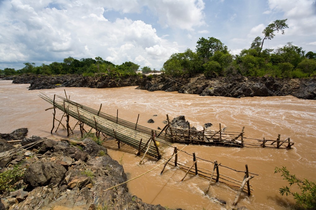 A bamboo fish trap off one of Laos’ Four Thousand Islands. Picture: Alamy