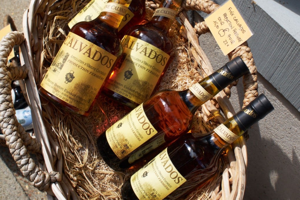 Bottles of calvados for sale in Normandy, France. Photo: Alamy