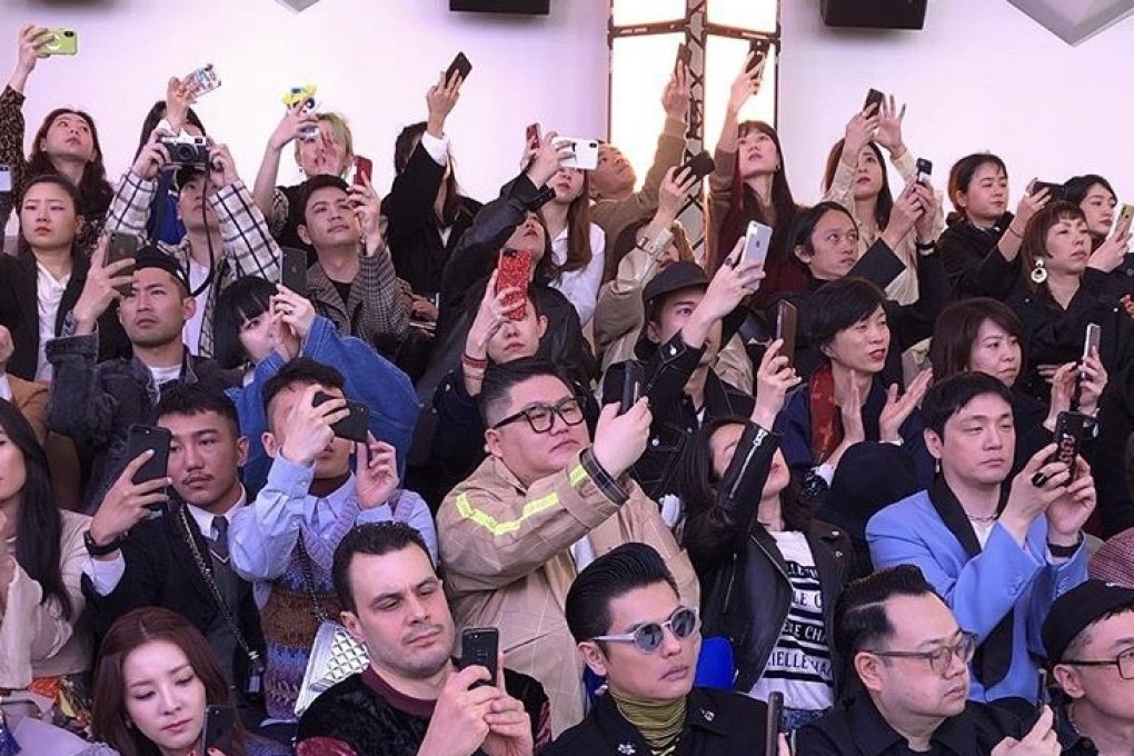 Detail from the image posted on Instagram by Robin Givhan of The Washington Post, depicting Asian editors and influencers at the Chloé fashion show in Paris in February, which she captioned “Amateur photographers”. Photo: courtesy of Instagram