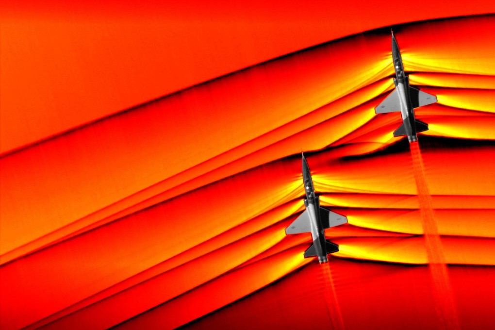Two supersonic T-38 jets flew just 9 metres apart below another plane waiting to photograph them with an advanced, high-speed camera. Photo: Nasa