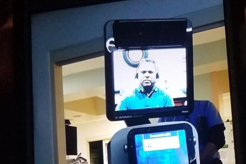 A robot machine rolled into intensive care and a doctor told the 78-year-old patient via video call he would probably die within days. Photo: Facebook