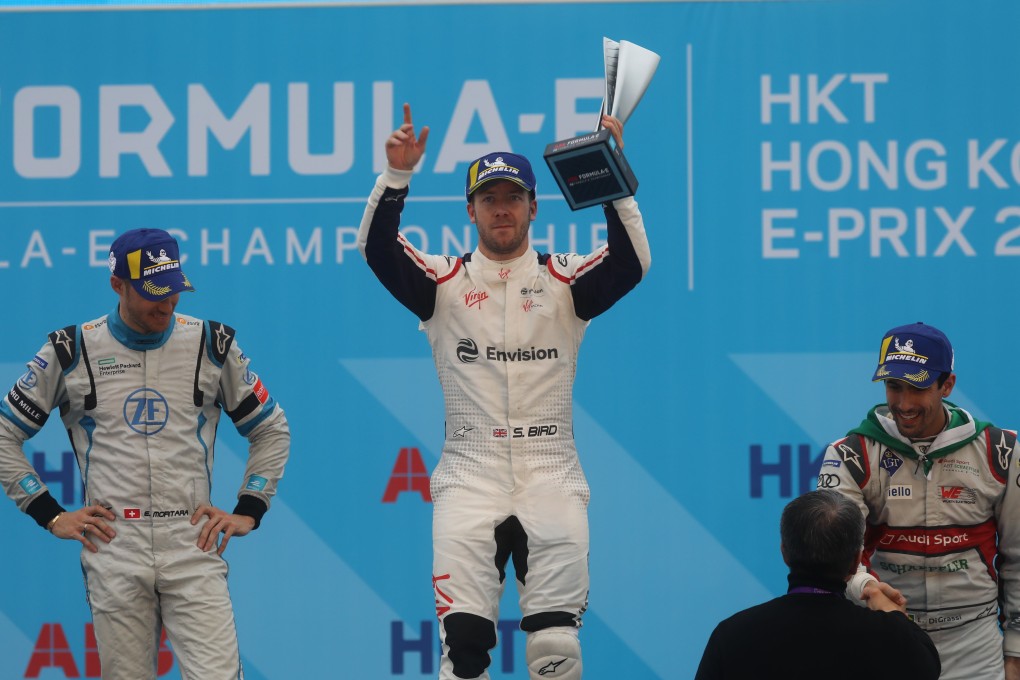 Sam Bird (centre) with Edoardo Mortara (left) and Lucas Di Grassi (right) on the podium. Mortara is the new race winner after stewards investigated an incident between Bird and Andre Lotterer. Photo: Sam Tsang