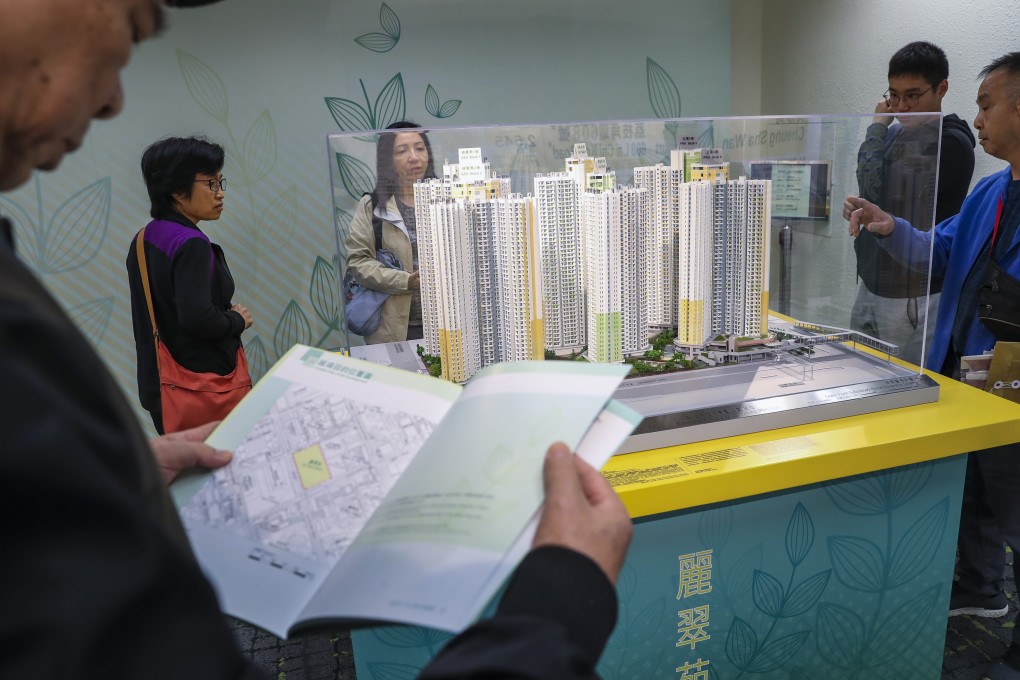 Potential tenants inspect a housing project model in Kwun Tong under the Green Form Subsidised Home Ownership Scheme. Hong Kong families wait an average of 5½ years for public rental flats. Photo: Winson Wong