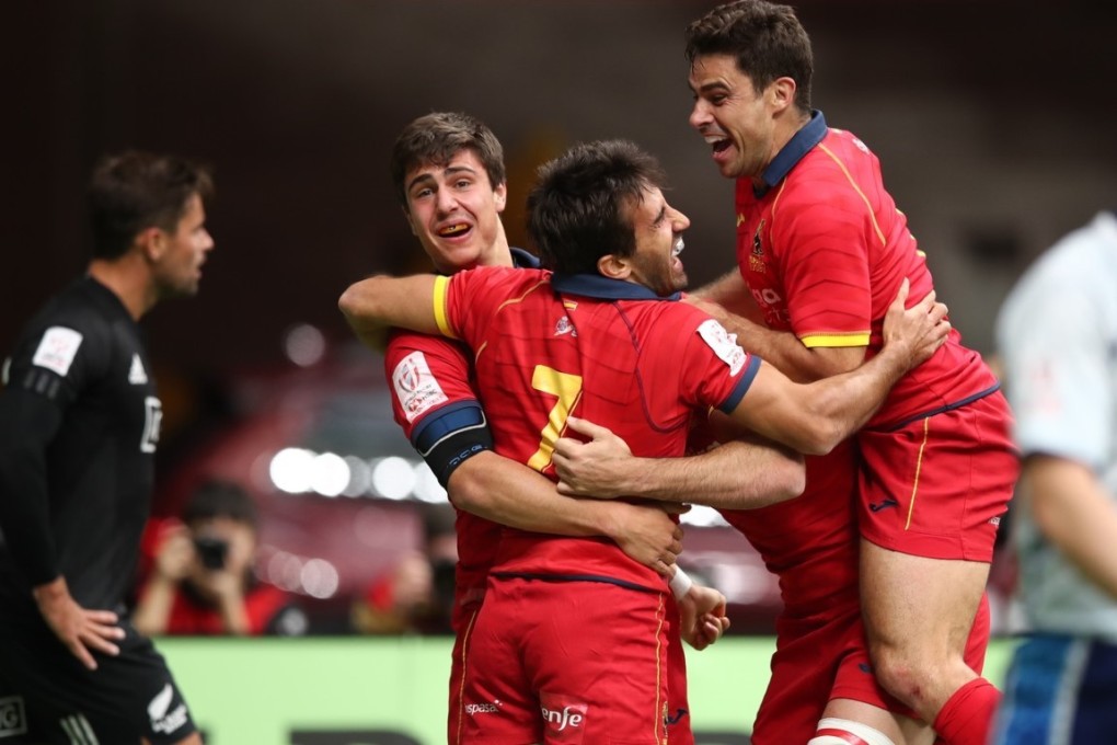 Spain players celebrate after beating New Zealand in the Canada Sevens.