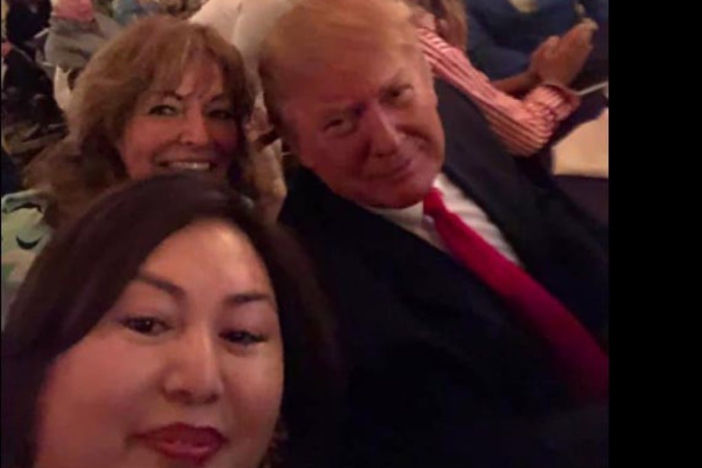Cindy Yang (front) snaps a selfie with US President Donald Trump at a Super Bowl watching party held at the president’s West Palm Beach country club on February 3. Photo: Facebook/Miami Herald/TNS)